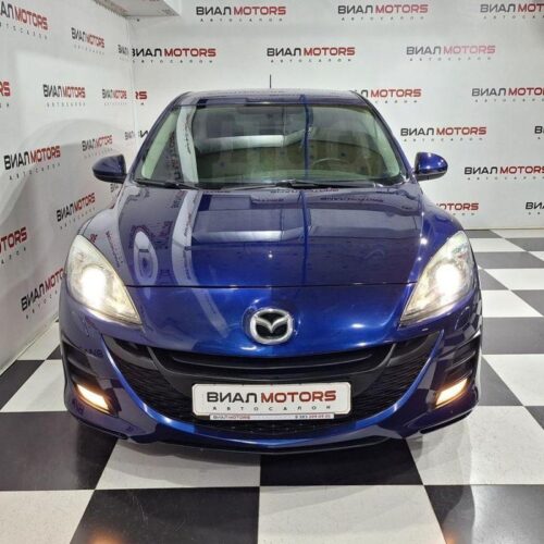 Mazda 3 1.6 AT (105 л.с.) 2010